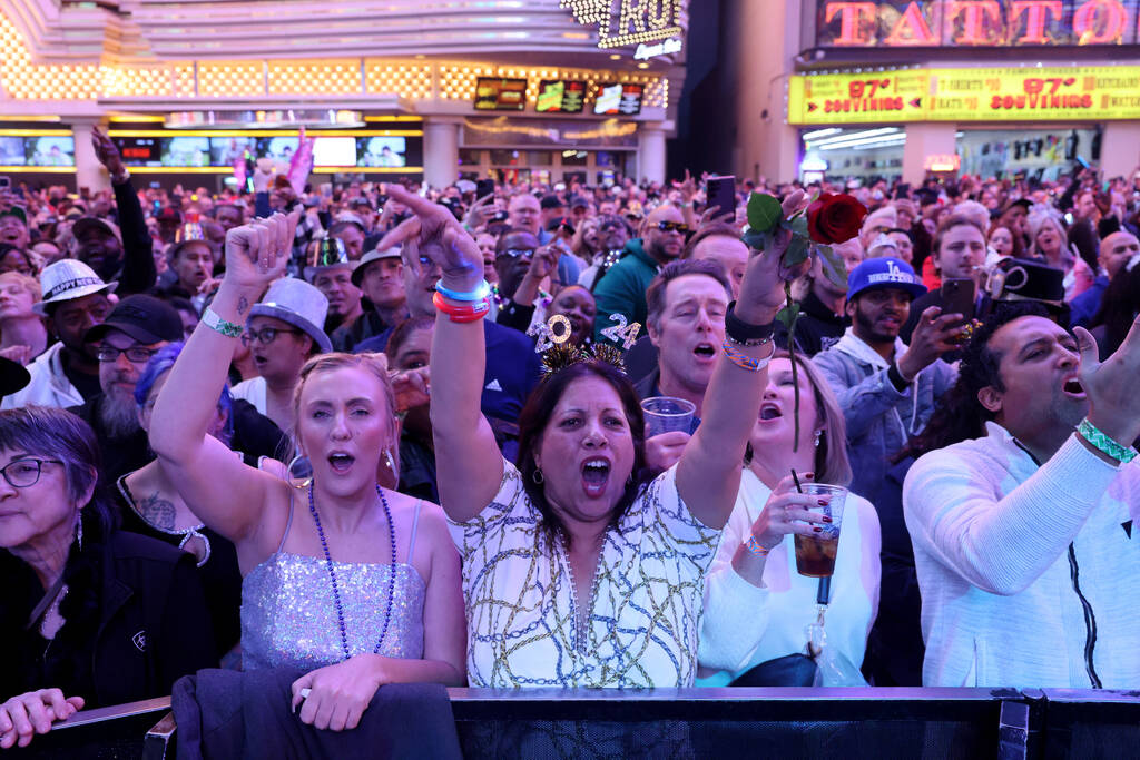 New Year’s Eve revelers celebrate during the Time of Your Life Festival at the Fremont S ...
