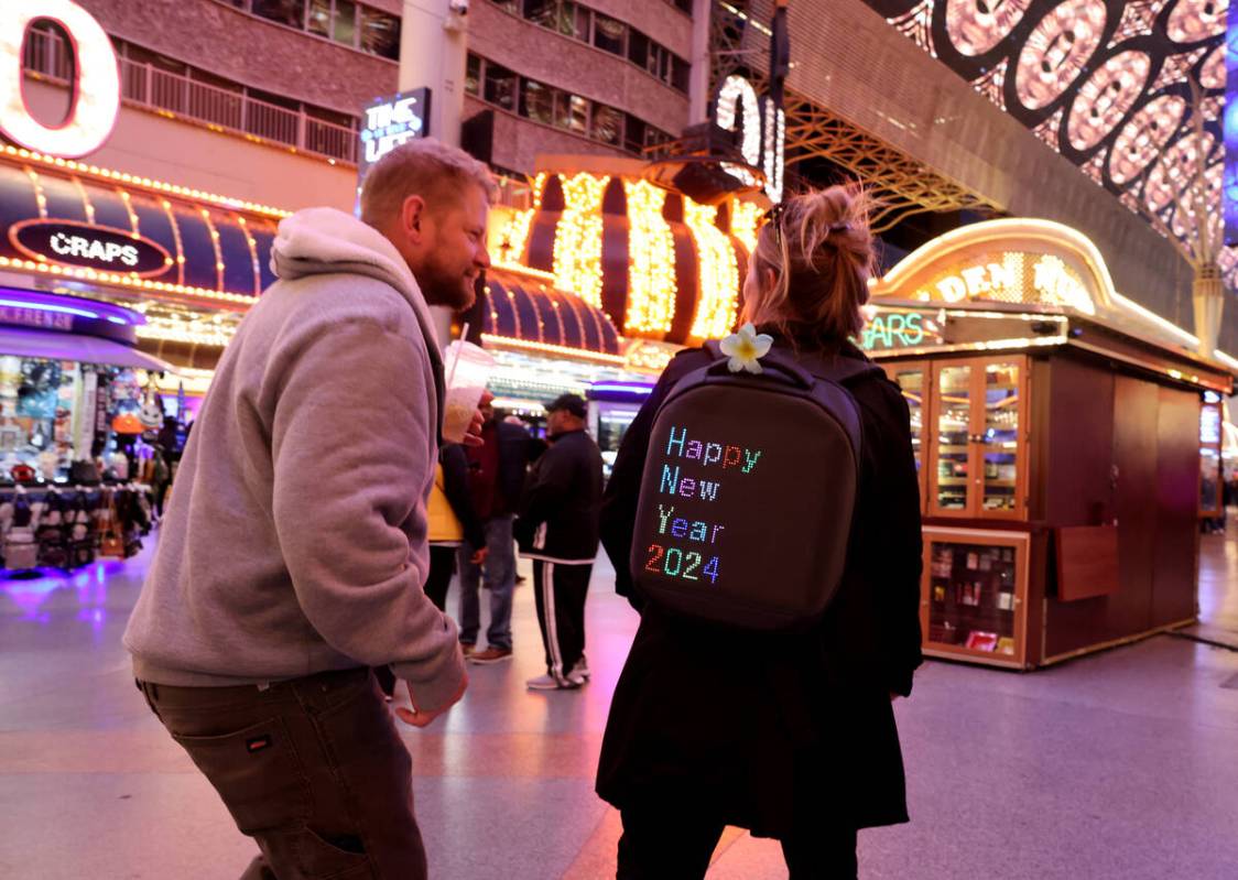 New Year’s Eve revelers Loni Duran and Jair West, both of Moab, Utah celebrate during th ...