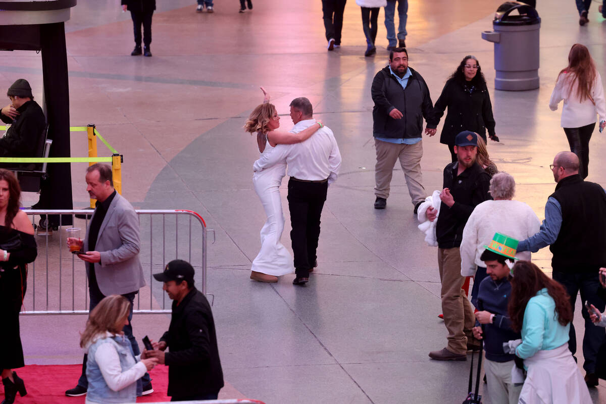New Year’s Eve revelers celebrate during the Time of Your Life Festival at the Fremont S ...