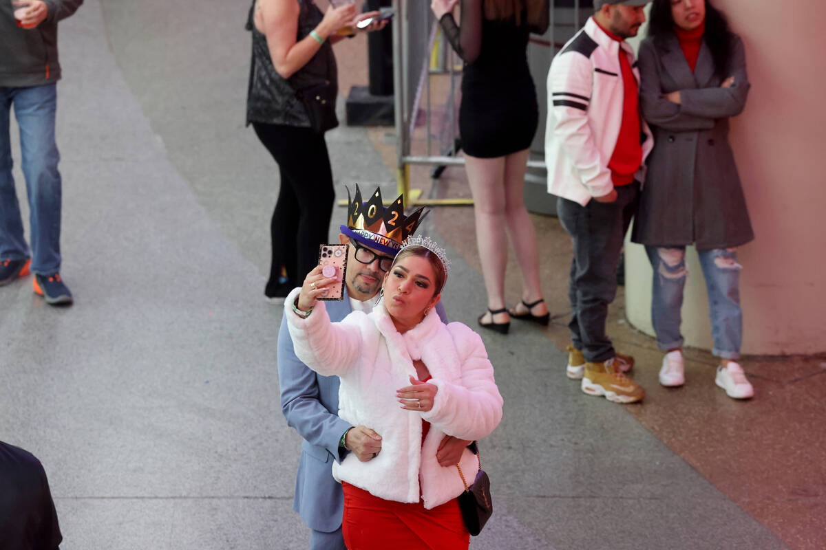 New Year’s Eve revelers celebrate during the Time of Your Life Festival at the Fremont S ...