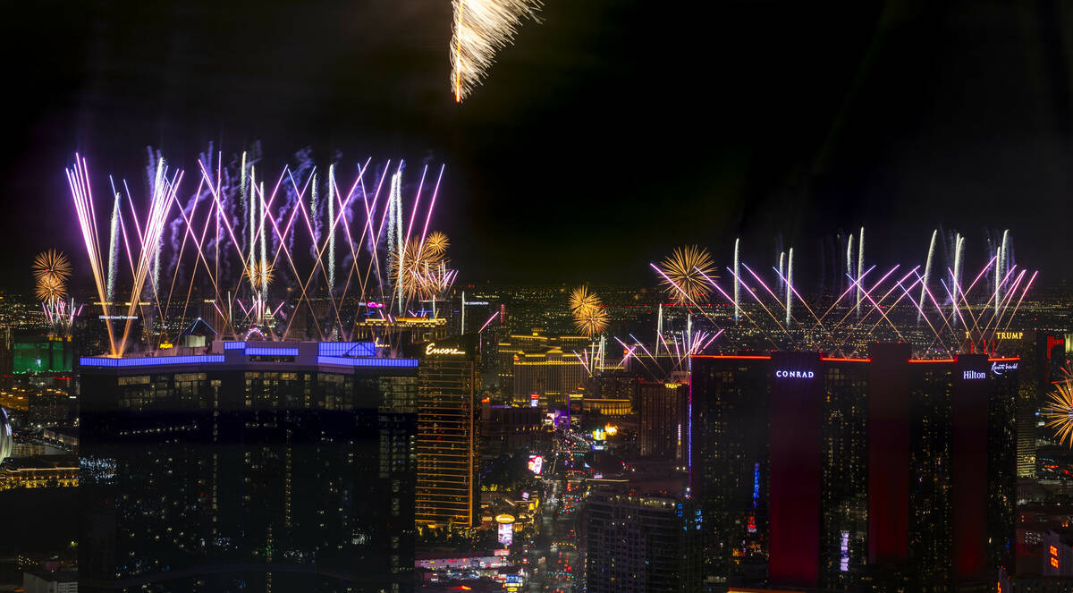 Fireworks erupt over the Las Vegas Strip as part of New Years Eve festivities across the city f ...