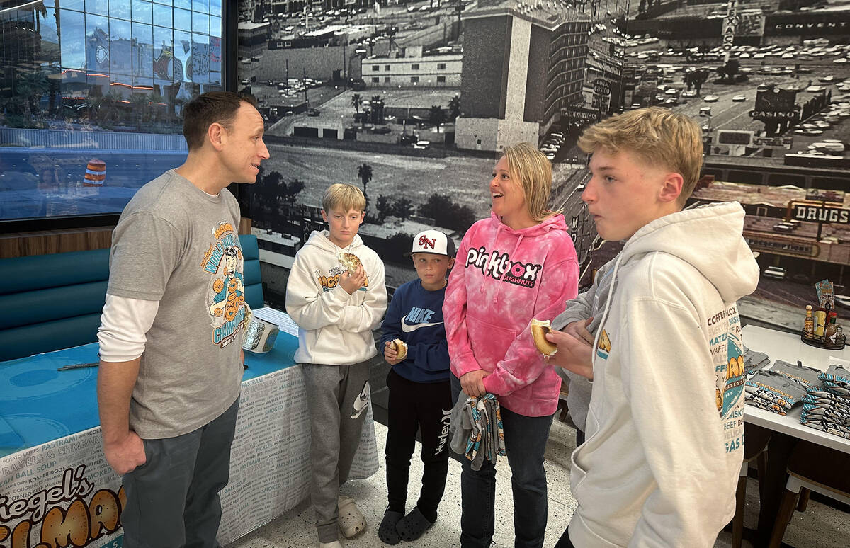 Competitive eating champion Joey Chestnut chats with fans during a meet-and-greet at Siegel’s ...