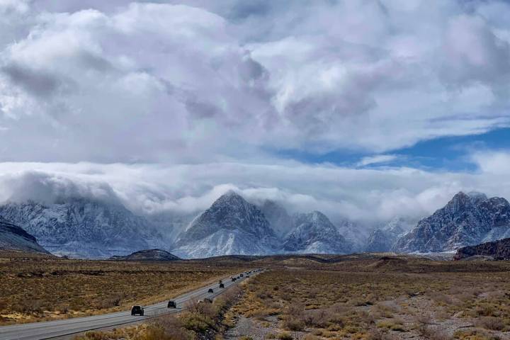 State Route 159 and snow covered mountains at Red Rock Canyon on Monday, Jan. 25, 2021, in Las ...