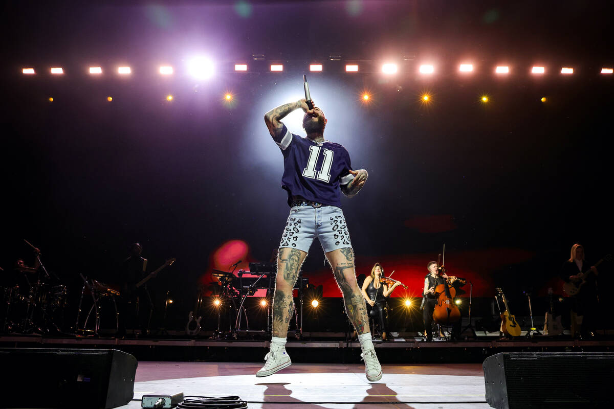 Post Malone performs onstage as Fontainebleau Las Vegas rings in 2024 at Fontainebleau Las Vega ...