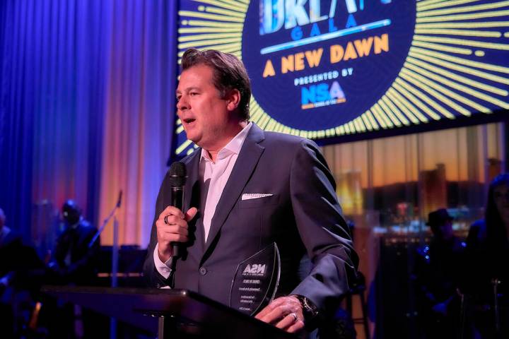 Eric Grilly of Cirque du Soleil accepts an honor on behalf of the company at the Nevada School ...