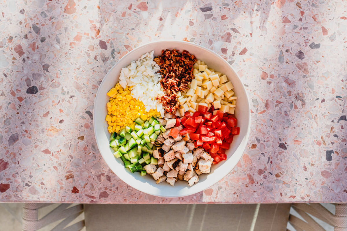 A Cobb salad from Backyard Grill, the bar and restaurant at Bel-Aire Backyard, the pool complex ...