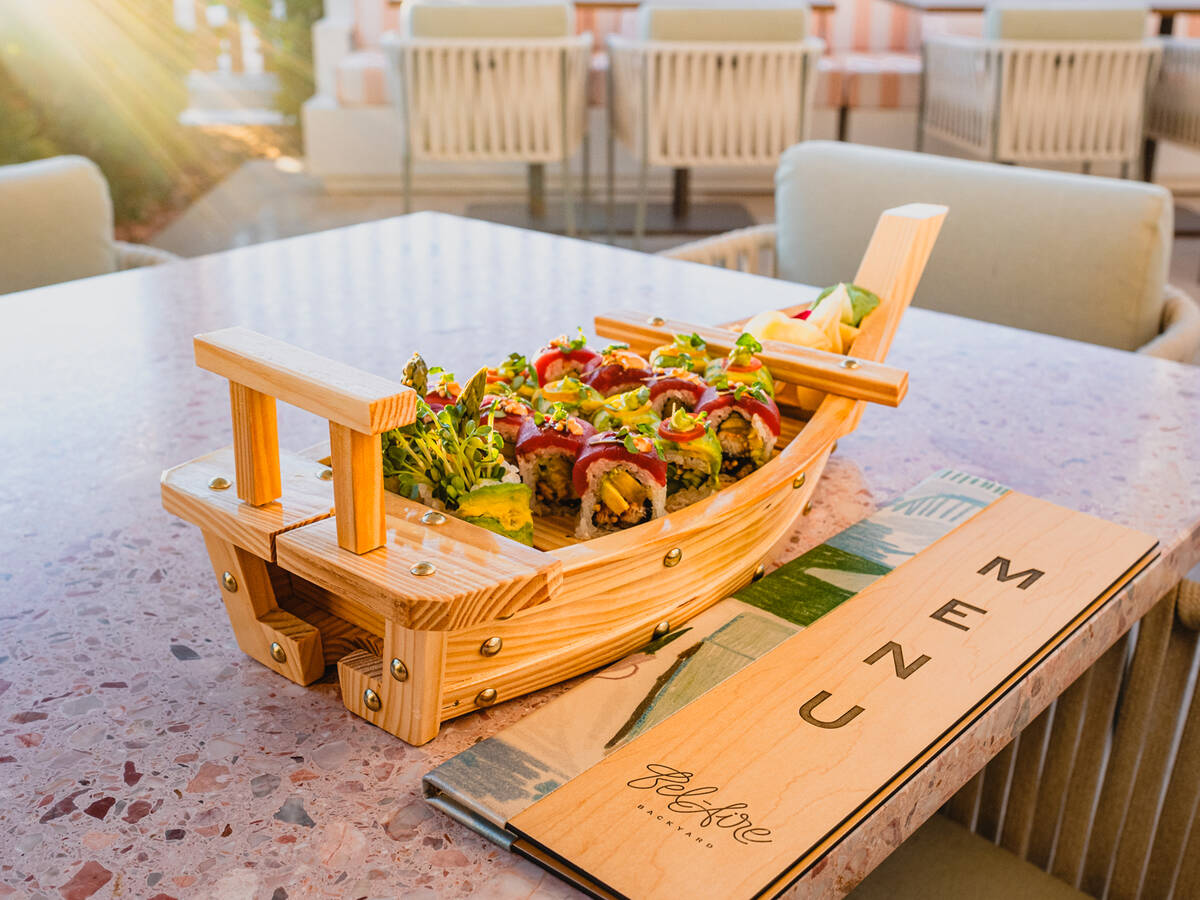 A sushi yacht with nigiri and sliced maki rolls from Backyard Grill, the bar and restaurant at ...