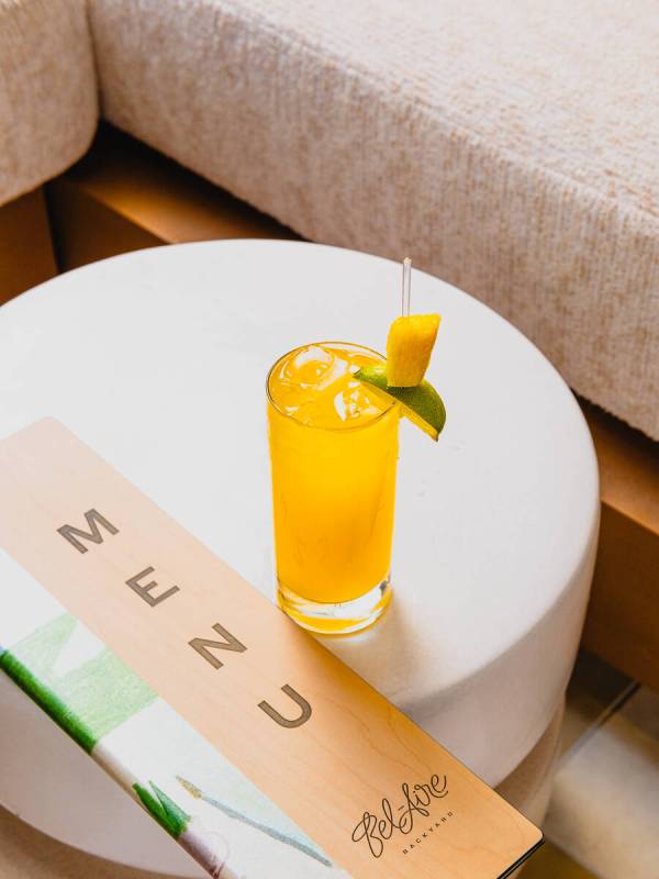 An Under the Palms cocktail from Backyard Grill, the bar and restaurant at Bel-Aire Backyard, t ...