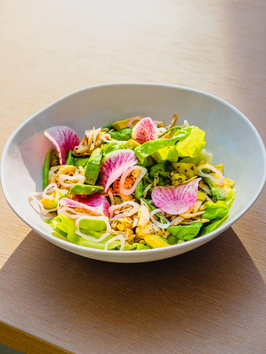 A warm crab and avocado salad from Backyard Grill, the bar and restaurant at Bel-Aire Backyard, ...