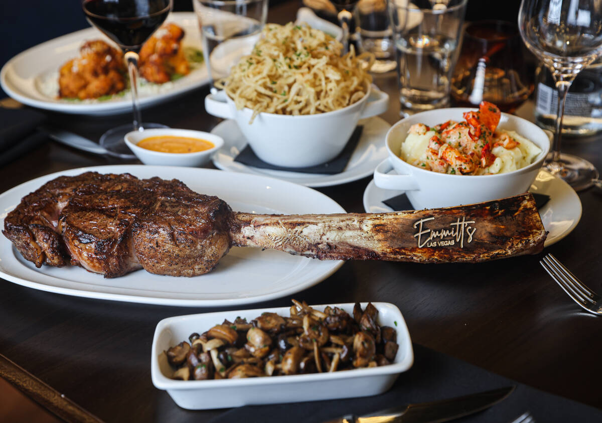 The ribeye logo tomahawk steak with a side of lobster mash potatoes and onion strings from Emmi ...