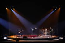 Bono, The Edge, Adam Clayton and Bram van den Berg of U2 perform during opening night of U2:UV ...