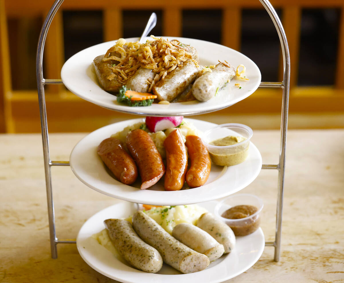 Sausage Tower, a sample of Bavarian sausages, served with imported sauerkraut, homemade Bavaria ...