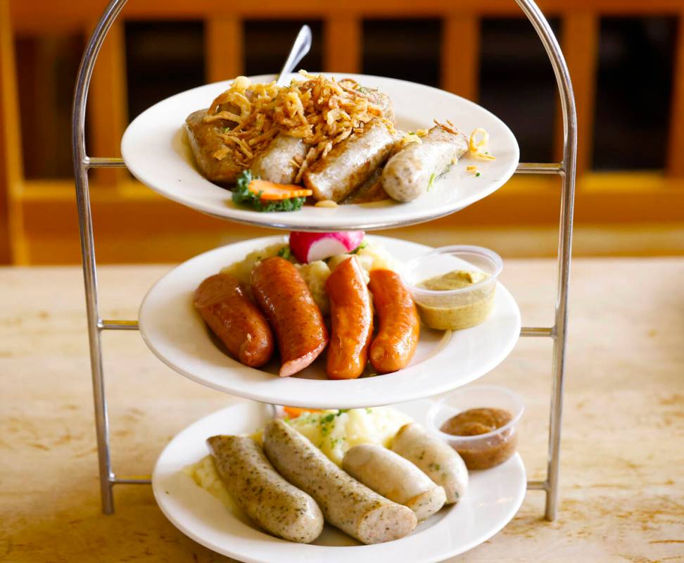 Sausage Tower, a sample of Bavarian sausages, served with imported sauerkraut, homemade Bavaria ...