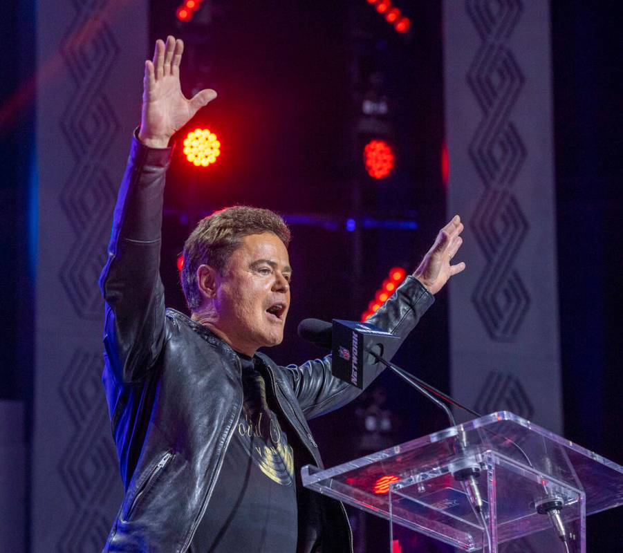 Donny Osmond speaks at the Draft Theater during the second day of the 2022 NFL draft on Friday, ...