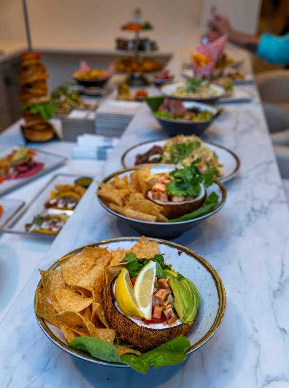 Some of the various food items being tasted to likely make the menu as Rock star Sammy Hagar is ...