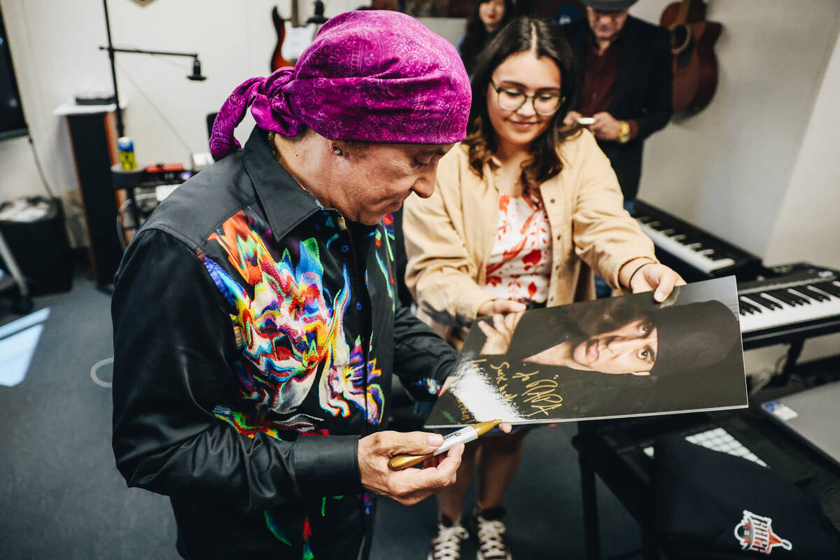 Stevie Van Zandt, a guitarist and member of Bruce Springsteen’s E Street Band, signs an ...