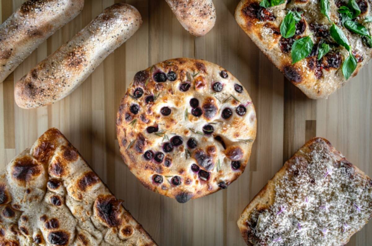 A bread presentation is part of the prix fixe brunch for Easter 2024 at Amari Italian Kitchen & ...