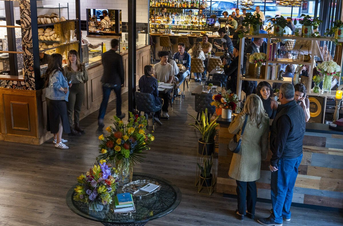 Guests arrive at Esther's Kitchen as the restaurant re-opens in its new $7 million space in Mar ...