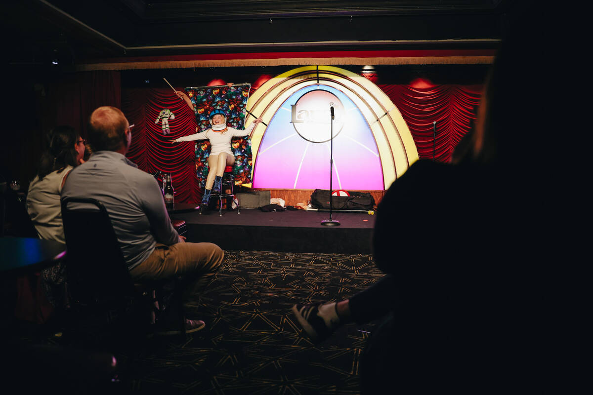 Comedian Harry Basil performs a kit with a crowd member during “Last Laughs at the Trop& ...