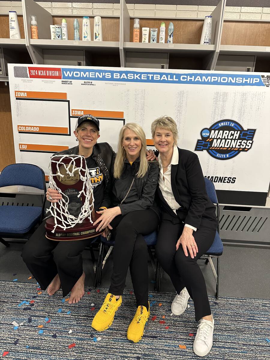 Westgate Las Vegas President and GM Cami Christensen, center; Iowa Associate Head Coach Jan Jen ...