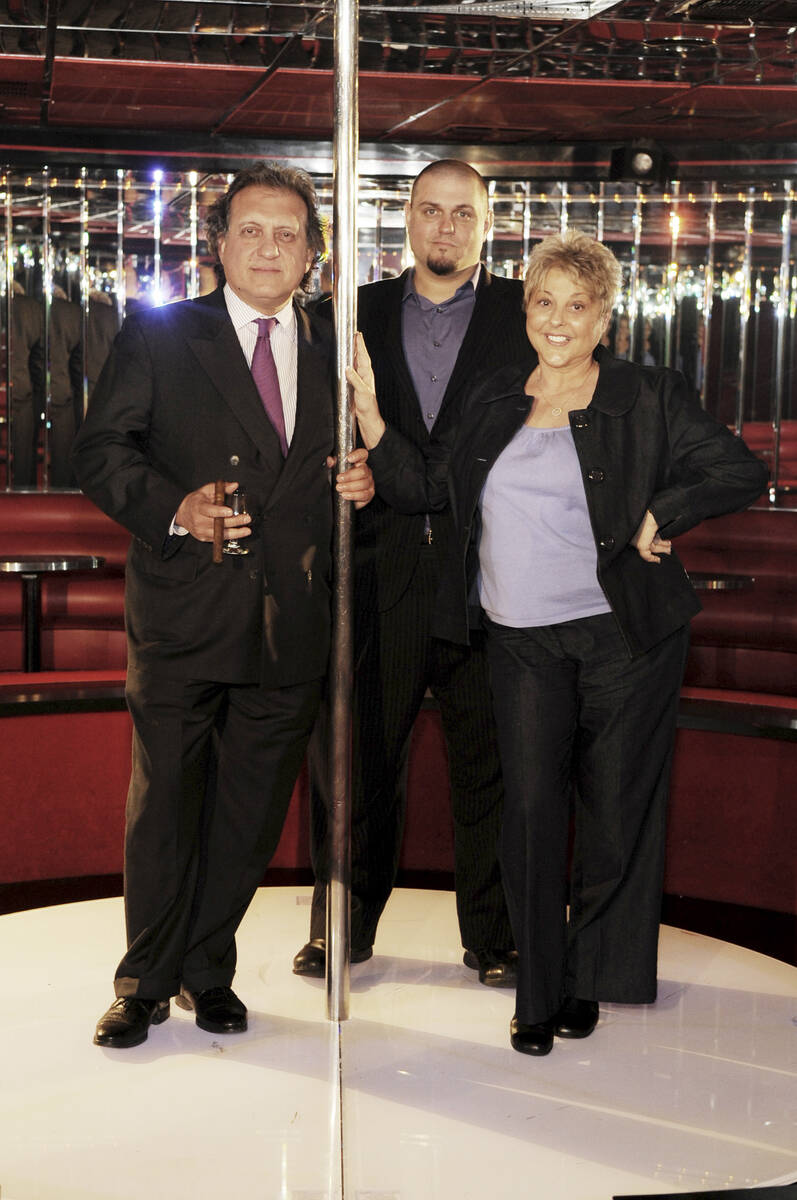 Adam Gentile is flanked by his father, attorney Dominic Gentile, and mother, Michelle Gentile, ...