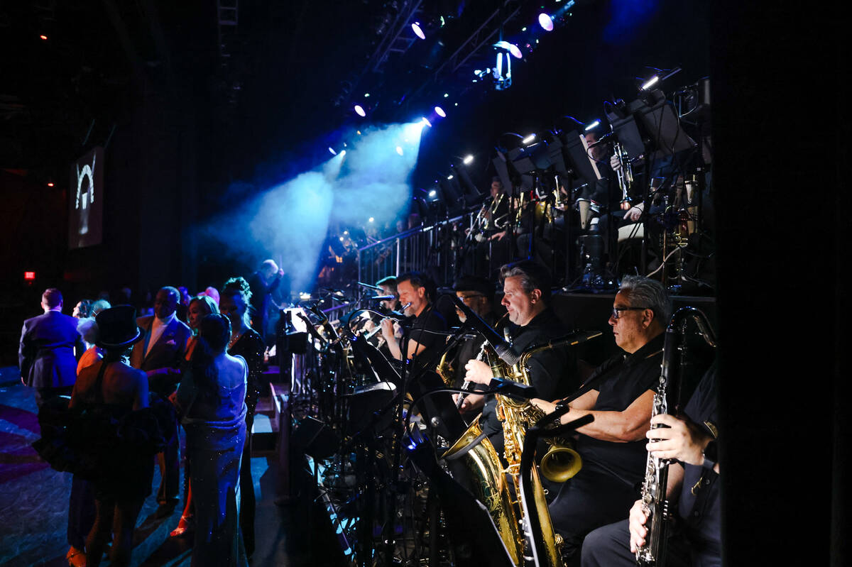 A 30 piece orchestra plays as actors work the stage during dress rehearsal for FOLLIES, a broad ...