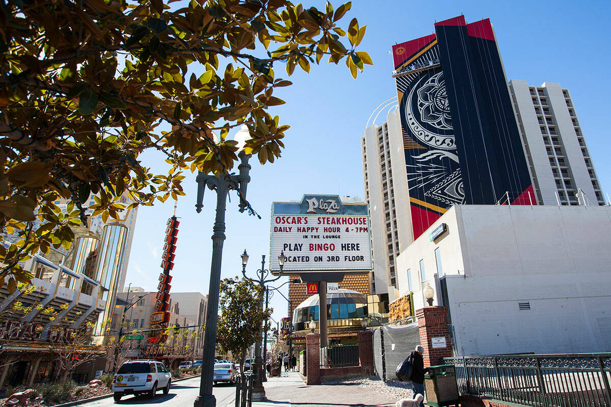 A mural by contemporary street artist Shepard Fairey is shown in progress on the side of The Pl ...