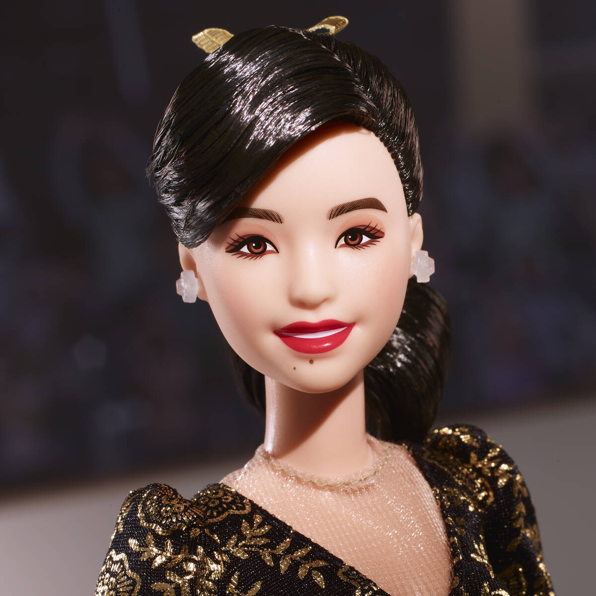 This image provided by Mattel in April 2024 shows the company's Kristi Yamaguchi Barbie doll. Y ...