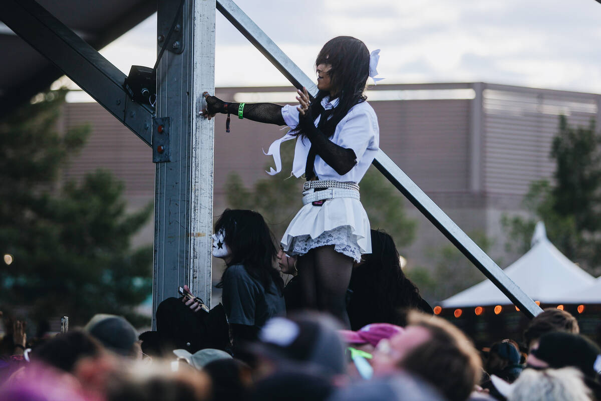 Fans try to get a good look at a band playing during the Sick New World music festival at the L ...