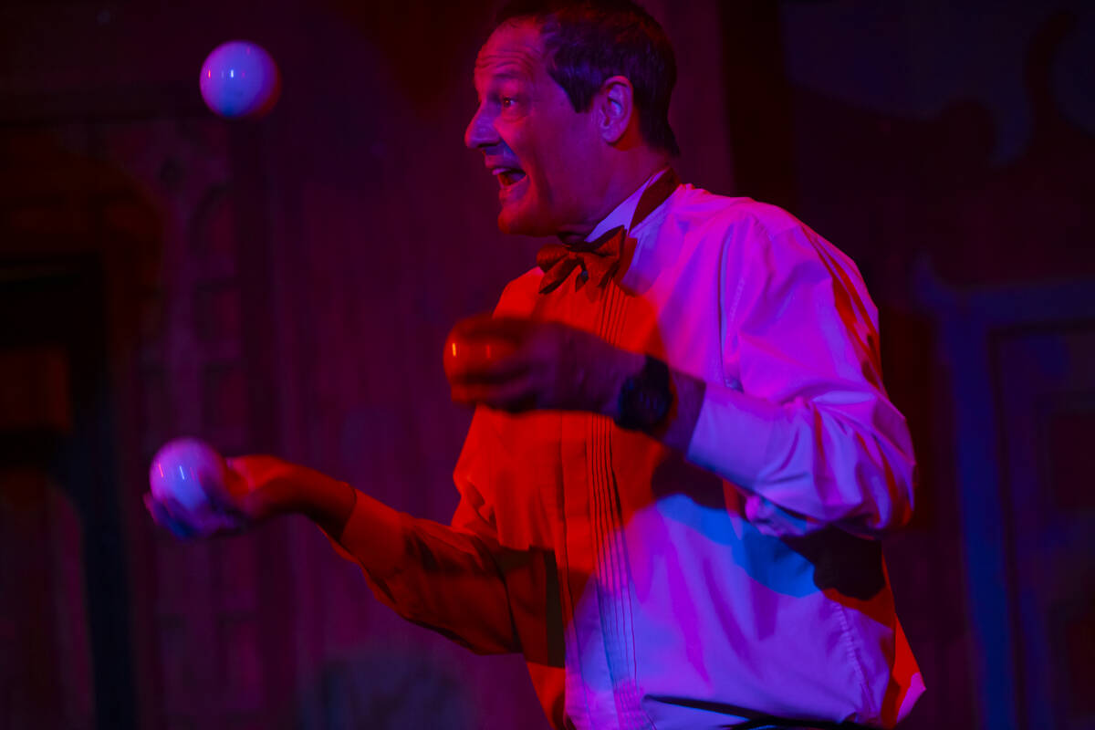 Circus artist Kip Reynolds performs during the closing night of Lost Spirits Distillery at Area ...