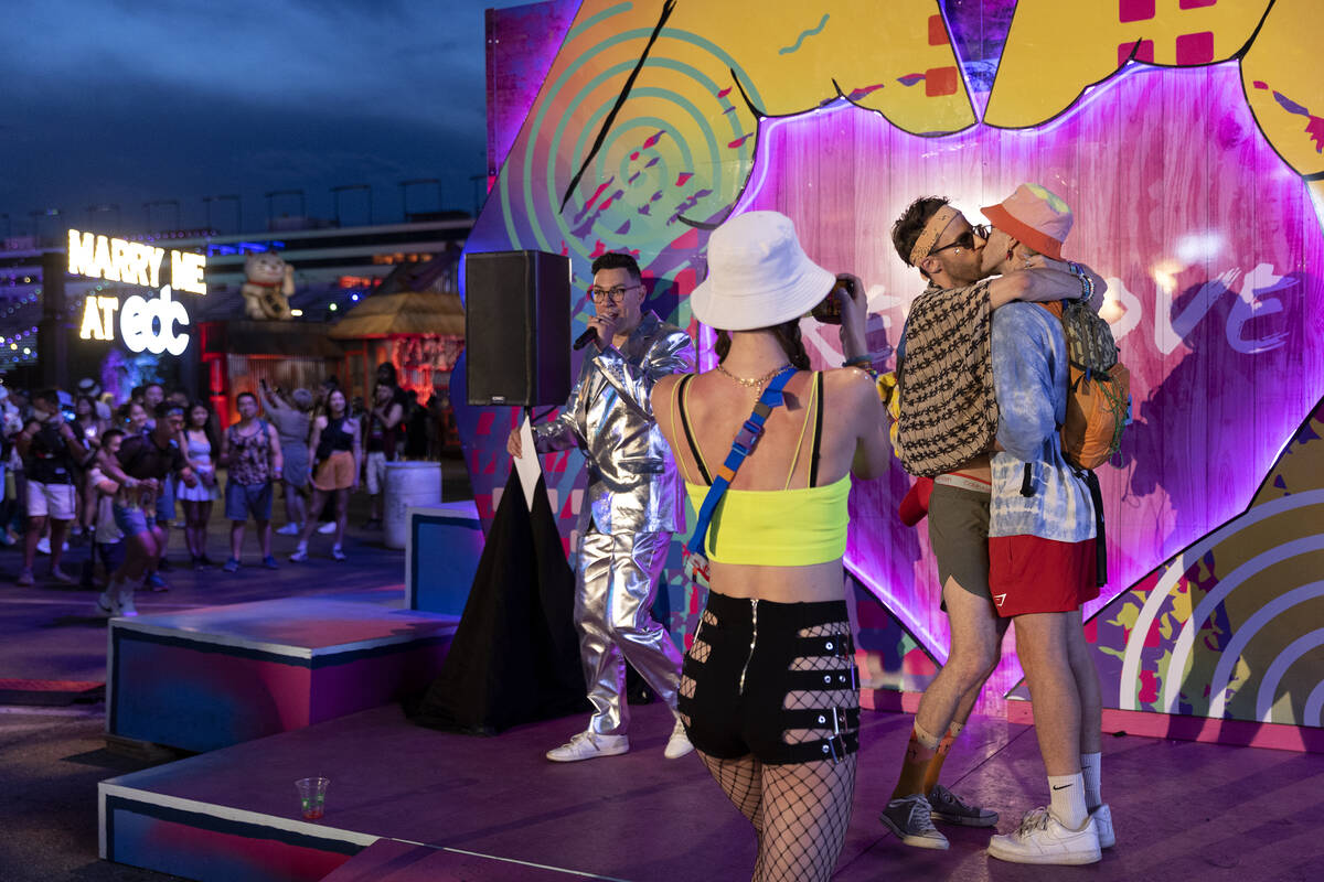 Nick Vivion and Beau Minder share a kiss as they are married during the second day of electroni ...