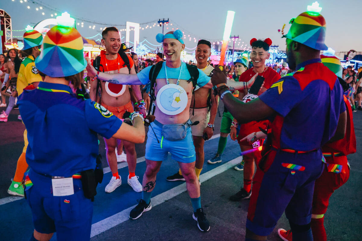 Performers dressed as police officers stop festival attendees as a joke during day one of Elect ...
