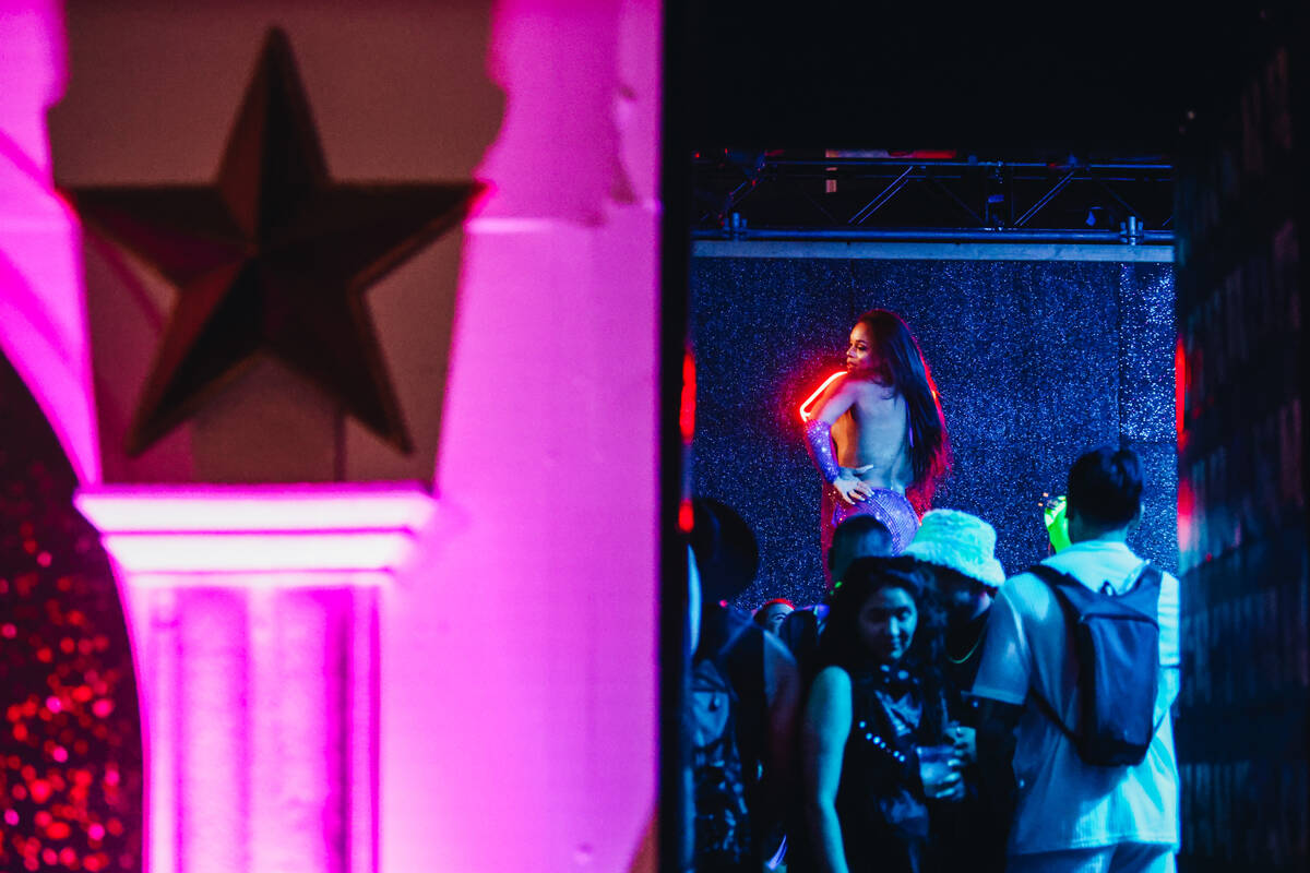 Festival attendees watch perforce inside of The Queen during day one of Electric Daisy Carniva ...
