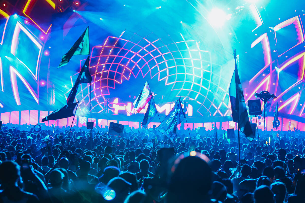 Festival attendees take in day one of Electric Daisy Carnival at the Las Vegas Motor Speedway o ...