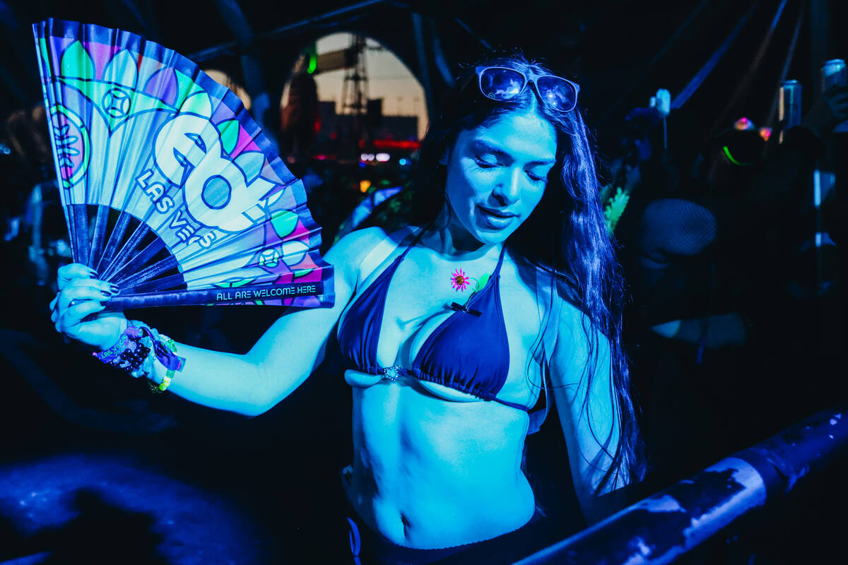 EDC attendees dance to a DJ set during day one of Electric Daisy Carnival at the Las Vegas Moto ...