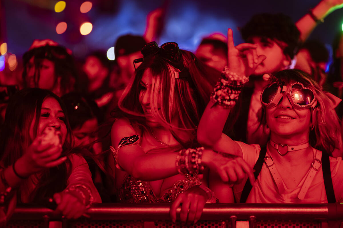 Attendees dance as Marauda performs at the Basspod stage during the first night of the Electric ...