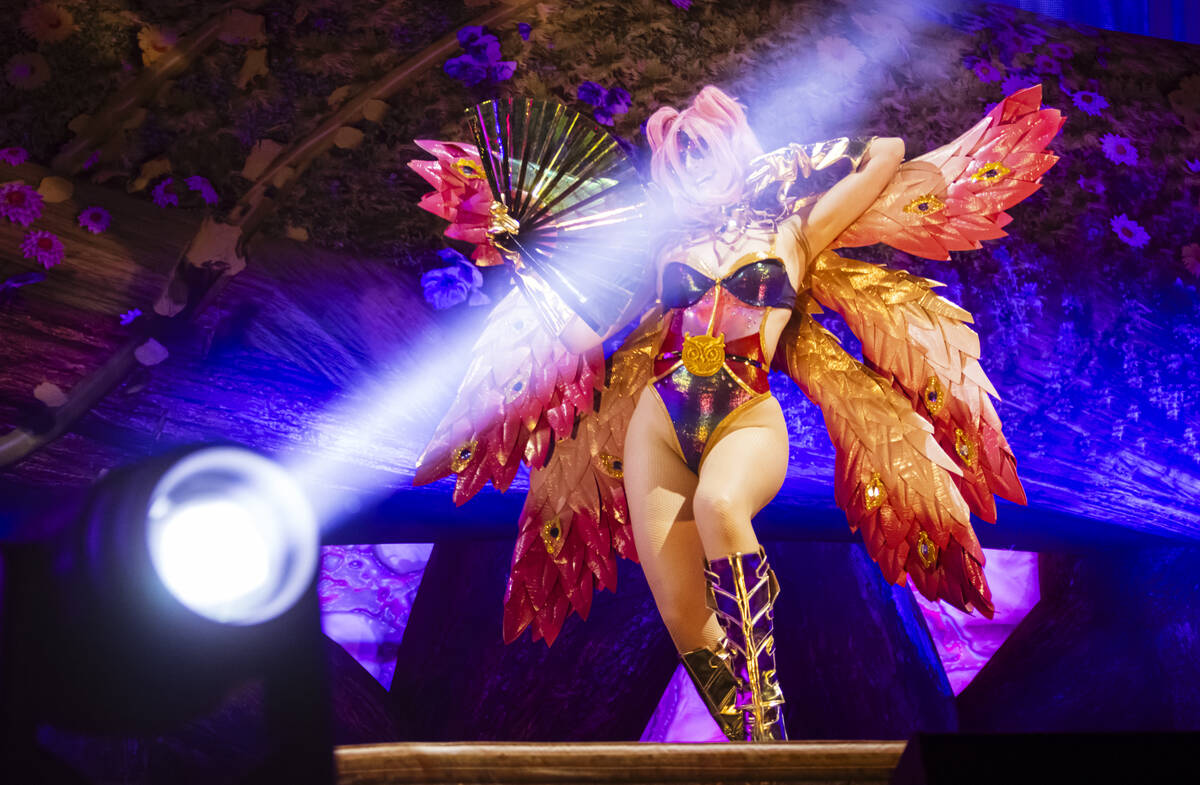 A dancer performs at the Kinetic Field stage during the first night of the Electric Daisy Carni ...