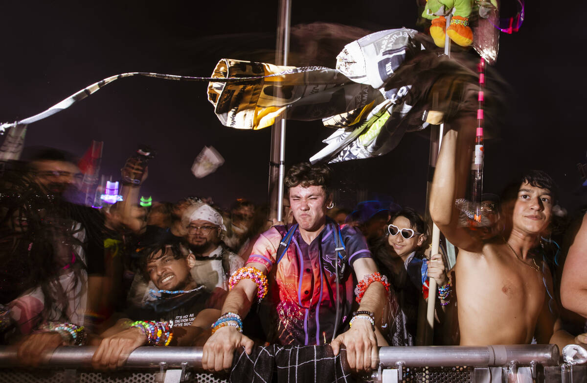 Attendees dance as Marauda performs at the Basspod stage during the first night of the Electric ...