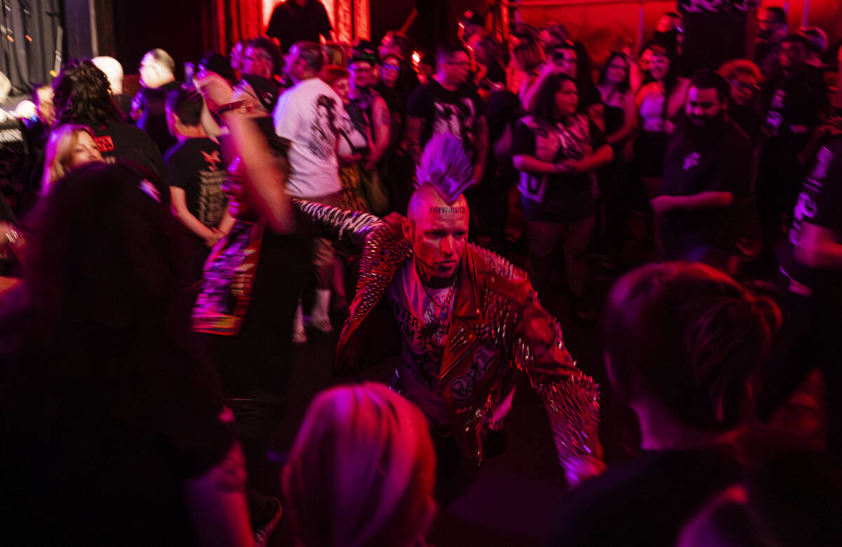 Festival attendees mosh as The Meteors perform during a Punk Rock Bowling music festival club s ...