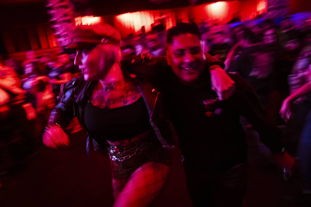 Festival attendees mosh as The Meteors perform during a Punk Rock Bowling music festival club s ...