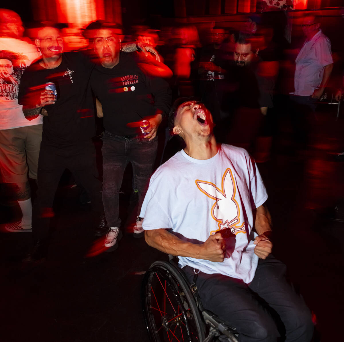 Festival attendees mosh as The Meteors perform during a Punk Rock Bowling music festival club s ...