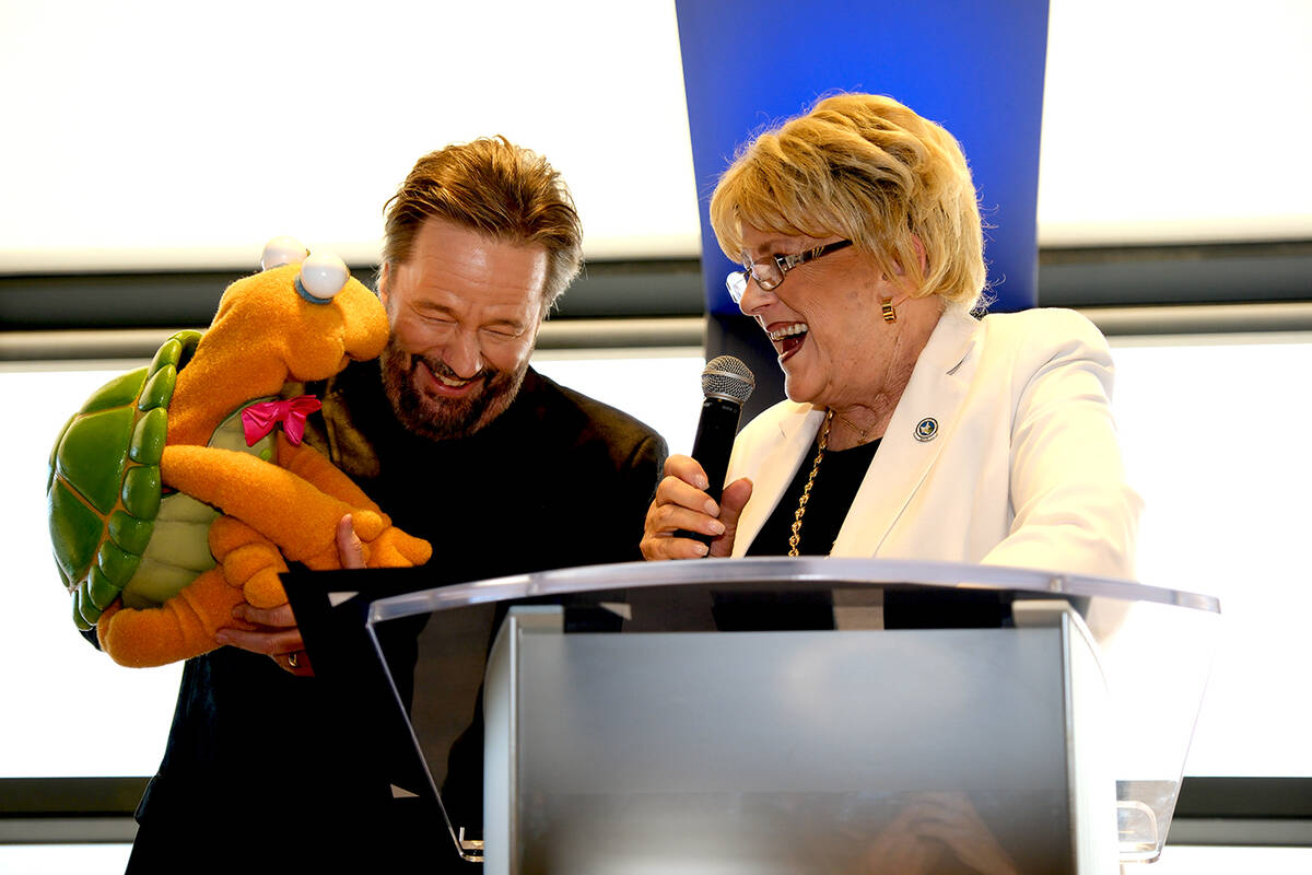 Terry Fator, with Winston the Impesonating Turtle, is shown with Mayor Carolyn Goodman at The S ...