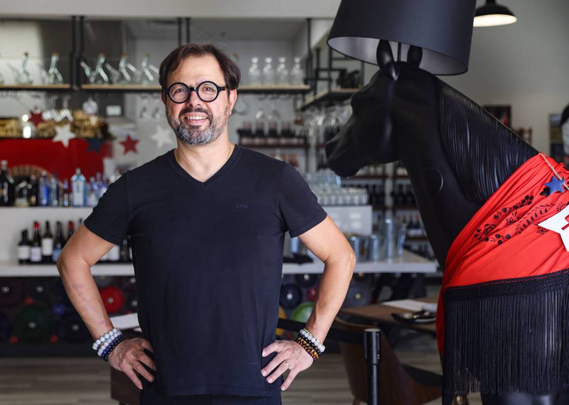 Chef Rafael Salines-Catalá poses for a portrait at his tapas restaurant, Jamón Jamón Wood Fi ...
