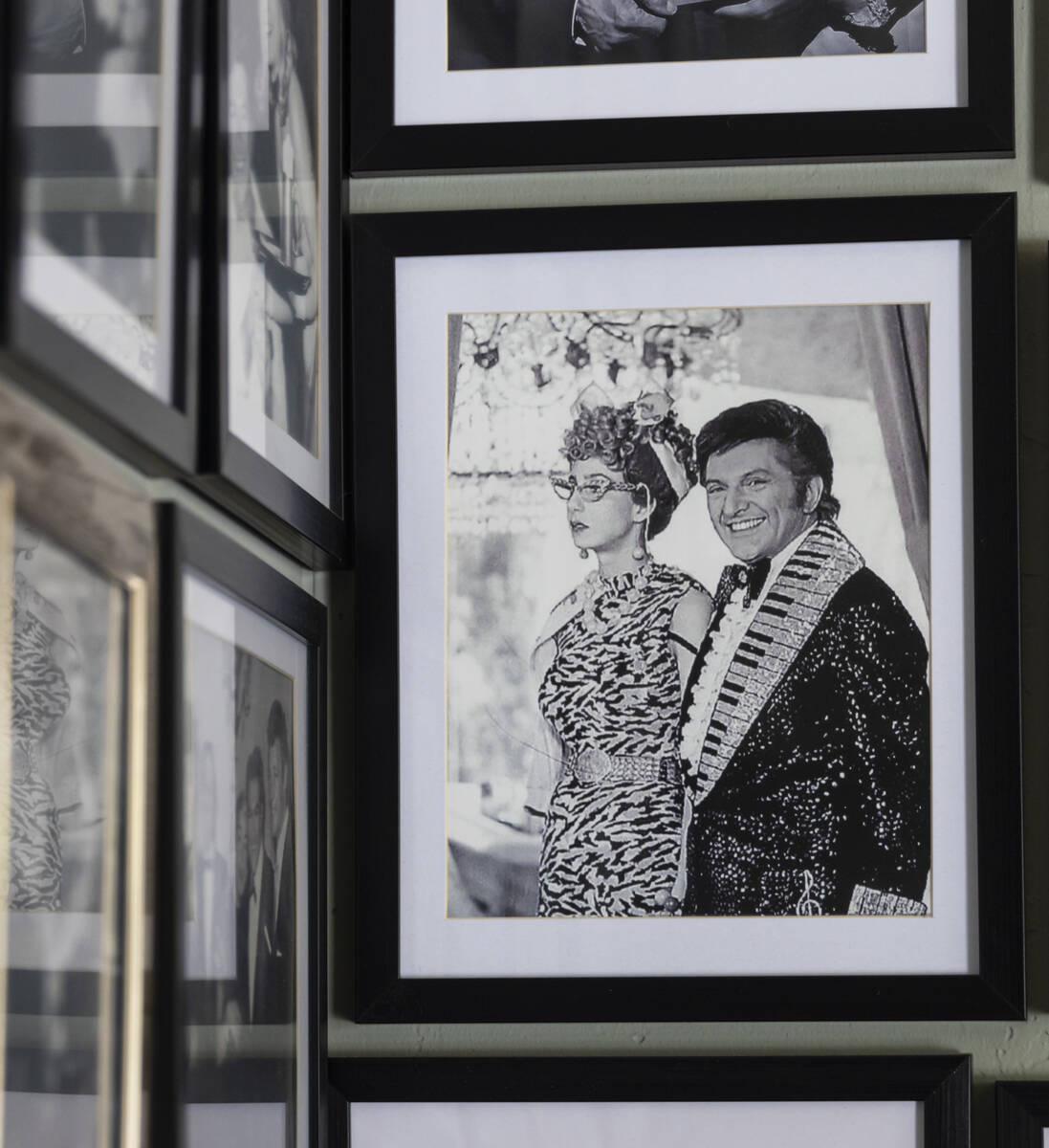 Cher, dressed as Laverne, is seen with Liberace during a tour of the Liberace Museum Collection ...
