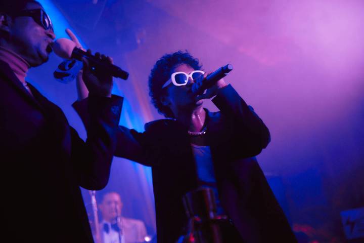 Babyface and Bruno Mars are shown at the VIP opening of The Pinky Ring at Bellagio on Saturday, ...