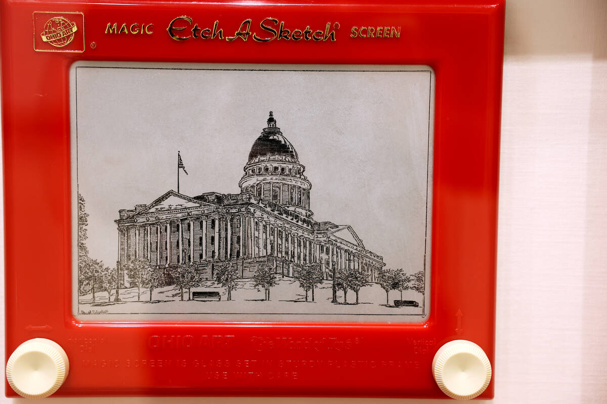 Works of art using Etch-A-Sketch toys, including Capitol Hill by David Roberts, are on display ...