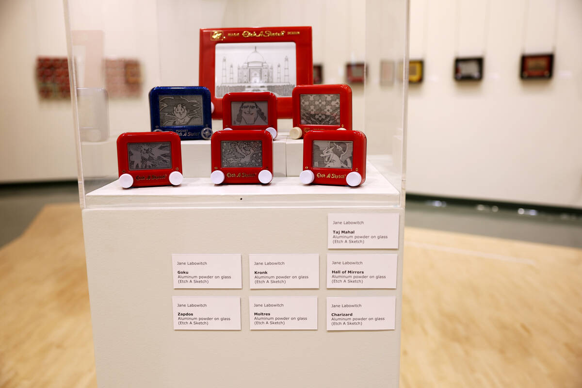 Works of art using Etch-A-Sketch toys, including pieces by Jane Labowitch, are on display in th ...