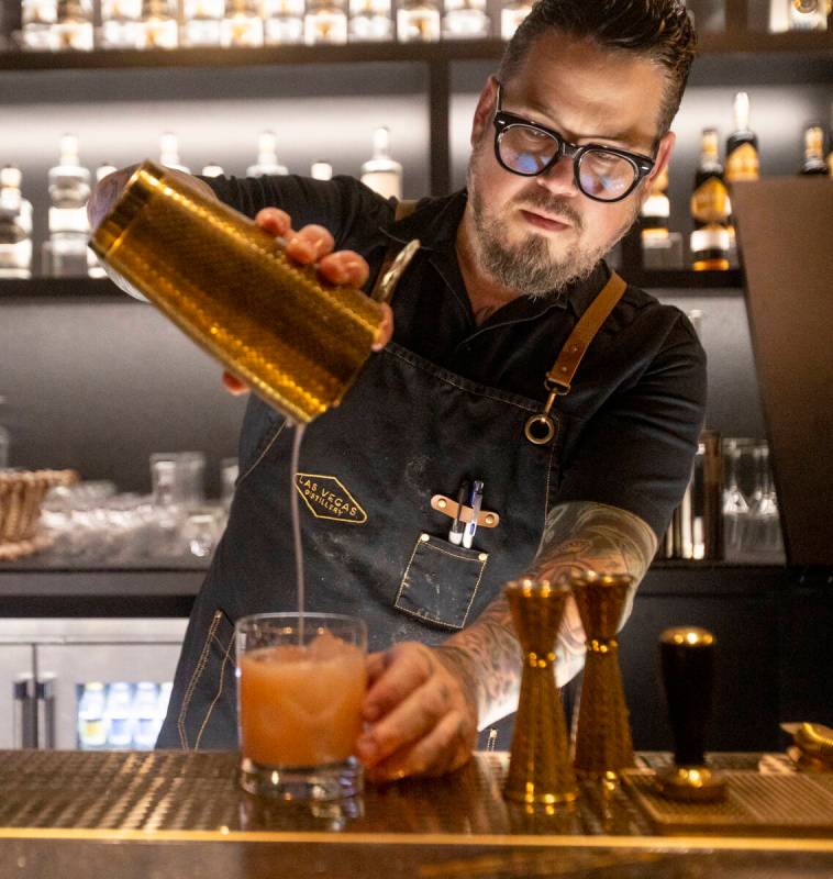 Bartender Joe Reves pours an Eastgate Sour at Las Vegas Distillery in Henderson. (Daniel Jacobi ...