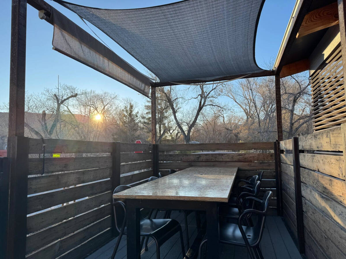 Dining in the flatbed of an old mining truck integrated into the terrace of Cottonwood Station, ...