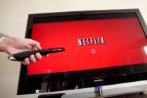 In this Associated Press file photo, a Netflix customer uses Netflix in Palo Alto, Calif. (AP P ...